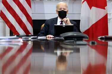 US President Joe Biden joins a video conference call with Canada’s Prime Minister Justin Trudeau from the White House in Washington, February 23, 2021. REUTERS