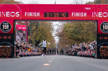 Handout photo dated 12/10/2019 provided by Bob Martin for The INEOS 1:59 of Eliud Kipchoge celebrates as he crosses finish line and makes history to become the first human being to run a marathon in under 2 hours during The INEOS 1:59 Challenge, Vienna, Austria. PA Photo. Issue date: Saturday October 12, 2019. Eliud Kipchoge has become the first marathon runner to break the two-hour barrier, recording a time of 1 hour 59 minutes 40 seconds in Vienna. See PA story ATHLETICS Kipchoge. Photo credit should read Jon Super for The INEOS 1:59 Challenge/PA Wire. NOTE TO EDITORS: This handout photo may only be used in for editorial reporting purposes for the contemporaneous illustration of events, things or the people in the image or facts mentioned in the caption. Reuse of the picture may require further permission from the copyright holder.