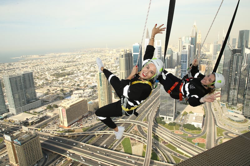 Visitors can walk around the 53rd-floor outdoor viewing platform with a harness on, and swing off the edge as part of the Sky Edge Walk. Photo: Sky Views Dubai