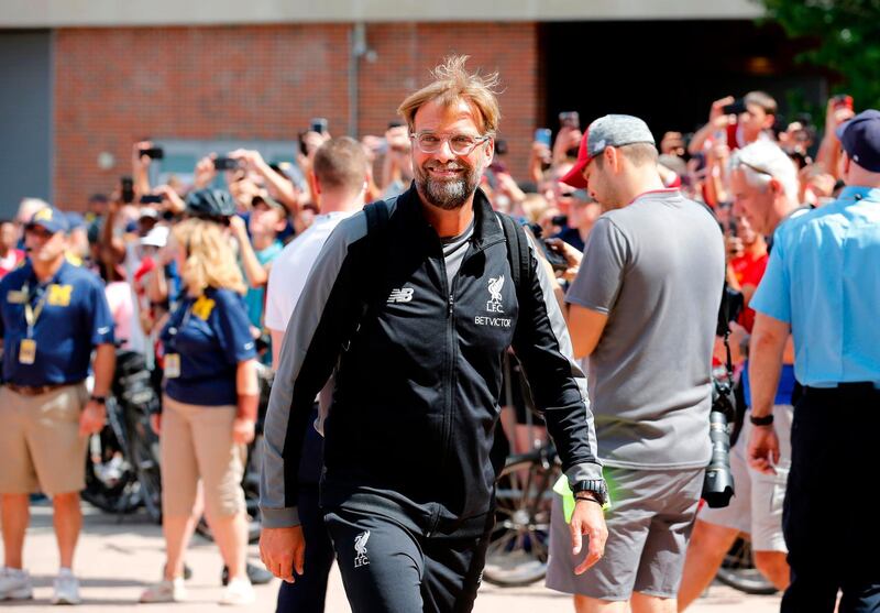 Liverpool FC coach Jurgen Klopp arrives for their match against the Manchester United in the 2018 International Champions Cup at Michigan Stadium on July 28, 2018 in Ann Arbor, Michigan. / AFP / JEFF KOWALSKY
