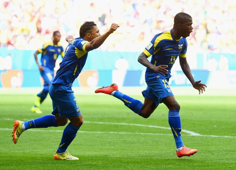 Enner Valencia of Ecuador, right, celebrates scoring his team's first goal with Jefferson Montero during their 2014 World Cup match against Switzerland on Sunday in Brasilia, Brazil. Stu Forster / Getty Images