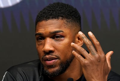A close up of Anthony Joshua's injuries during a press conference after the fight. PA
