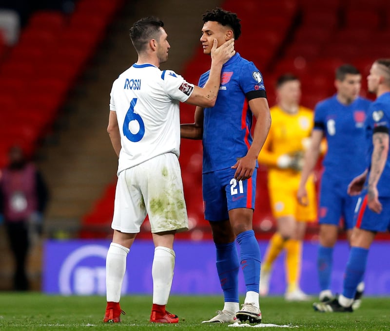 San Marino's Dante Rossi and England's Ollie Watkins after their match at the Wembley Stadium, London. PA