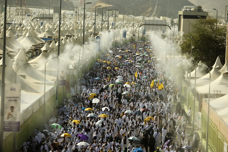 They walk to the site in Mina. Reuters
