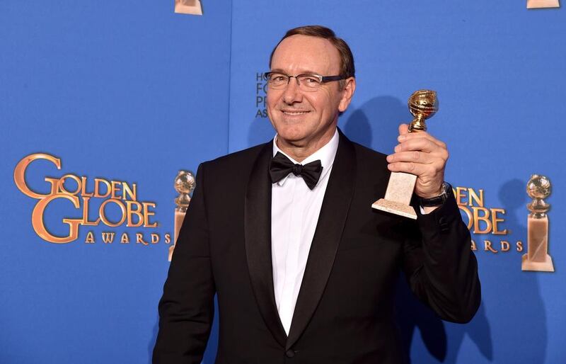 Spacey accepts a Golden Globe award for Best Actor in a Television Series Drama with 'House of Cards'. AFP