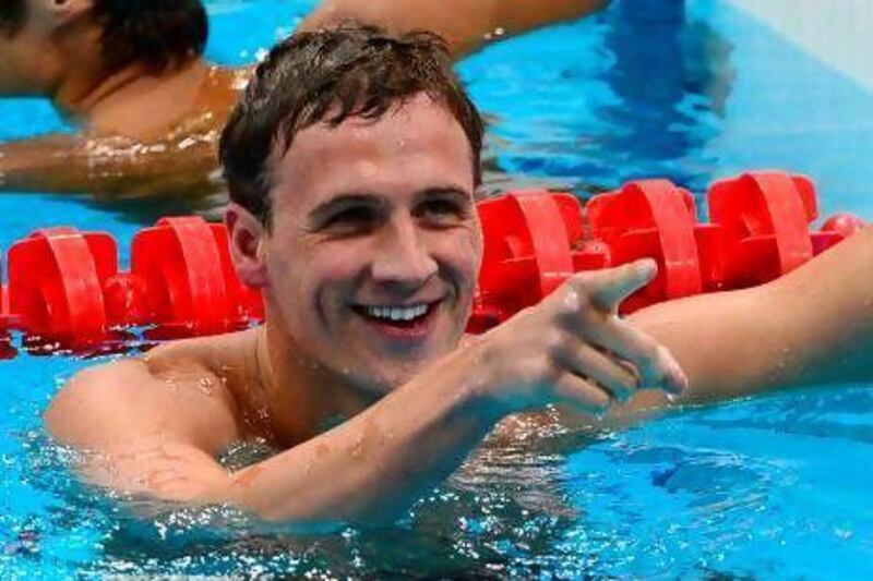 US swimmer Ryan Lochte reacts after winning the men's 400m individual medley final swimming event at the London 2012 Olympic Games. Emmanuel Dunand / AFP