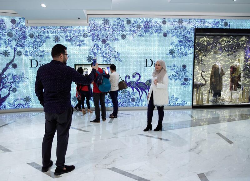 Abu Dhabi, United Arab Emirates, December 31, 2019.  A couple celebrating NYE at Galleria Mall, Al Maryah Island.      Victor Besa / The National