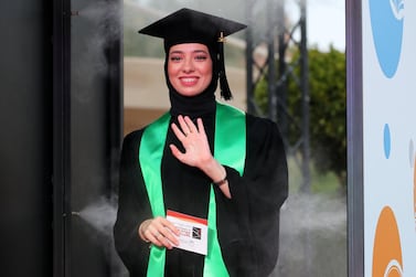Ajman, United Arab Emirates - Reporter: Anam Rizvi. News. A student goes through a sterilisation booth during her drive through graduation from Ajman University because of Covid-19. Wednesday, February 10th, 2021. Ajman. Chris Whiteoak / The National