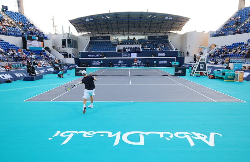 Denis Shapovalov hits a forehand to Taylor Fritz during their Mubadala World Tennis Championship quarter-final. Reuters