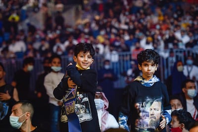 Young Saudi fans at the 2022 WWE Elimination Chamber at the Jeddah Super Dome. AFP
