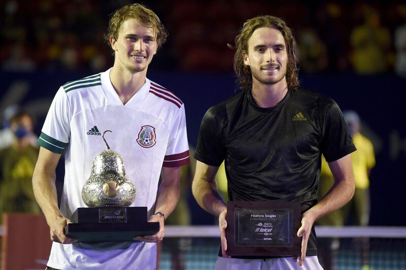 Germany's Alexander Zverev, left, poses with the trophy alongside Greece's Stefanos Tsitsipas. AFP