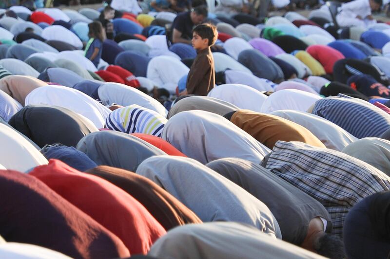 Muslims perform Eid Al Adha prayers in Amman, Jordan.  EPA