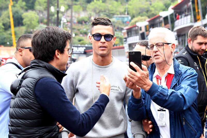 Ronaldo walks through the Monaco paddock. Getty