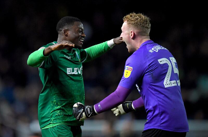 Sheffield Wednesday's Dominic Iorfa and Cameron Dawson celebrate after the 2-0 win at Elland Road on January 11. PA