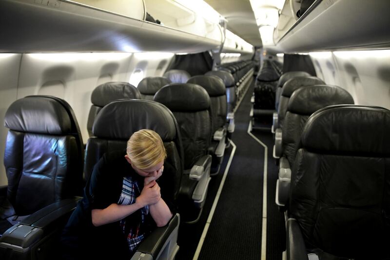 A flight attendant waits for the departure of a one-passenger flight between Washington and New Orleans as the spread of coronavirus disease (COVID-19) continues, in Washington, U.S. REUTERS