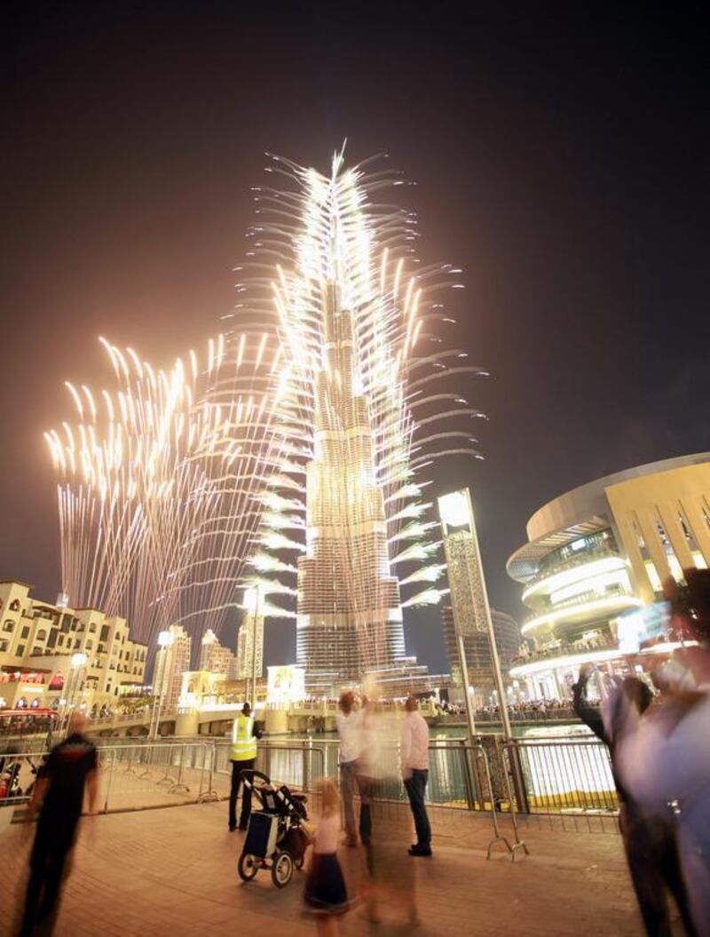 People watch fireworks at the Burj Khalifa. Ali Haider / EPA