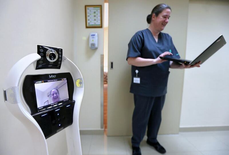 Arlene Susanne Ryan, quality coordinator explains about the VGo Robotic Telepresence at Amana Healthcare in Al Ain. Pawan Singh / The National