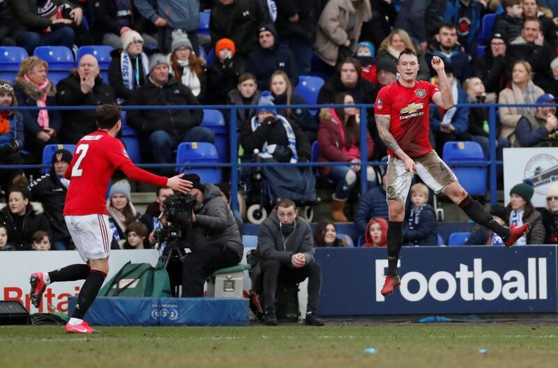 Manchester United's Phil Jones celebrates scoring their fourth goal. Reuters