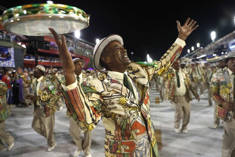 Members of Mangueira samba school parade during Carnival 2020. EPA