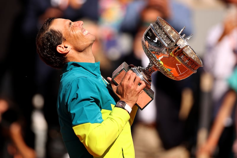 Rafael Nadal celebrates with the trophy. Getty