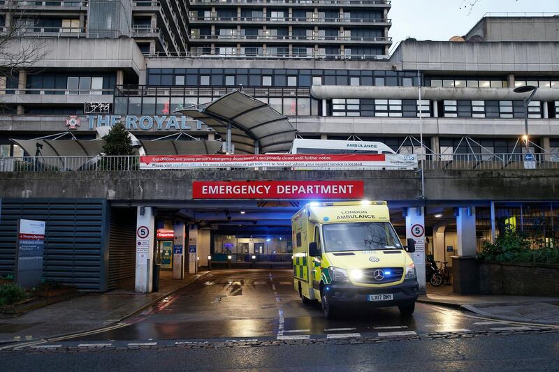 LONDON, ENGLAND - JANUARY 03: An ambulance leaves the emergency department at the Royal Free Hospital in the Borough of Camden on January 3, 2021 in London, England. The United Kingdom has recorded more than 50,000 new cases of Covid-19 for sixth day in a row. (Photo by Hollie Adams/Getty Images)