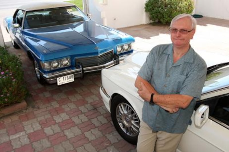 Donald Starkey imported both his 1973 Buick Riviera, top, and his 1998 Bentley Continental to the UAE, where he can afford to drive them with the low fuel prices.  Pawan Singh / The National