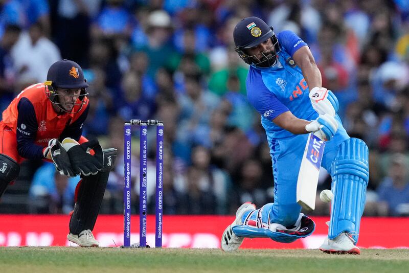 India captain Rohit Sharma hits a six during his fifty against the Netherlands in Sydney. AP