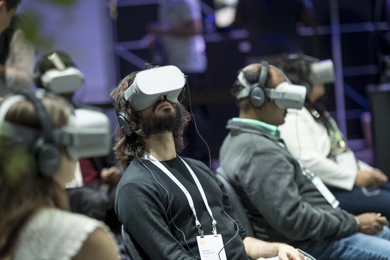 Attendees use Oculus VR Inc. GO virtual reality (VR) headsets during the F8 Developers Conference in San Jose, California, U.S., on Tuesday, April 30, 2019. Facebook Inc.’s Oculus virtual-reality division will start shipping its new Quest and Rift S headsets on May 21. Photographer: David Paul Morris/Bloomberg