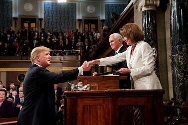 Donald Trump shakes hands with Speaker of the House Nancy Pelosi. Reuters