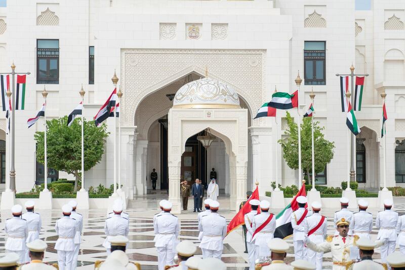 ABU DHABI, UNITED ARAB EMIRATES - November 12, 2018: HH Sheikh Mohamed bin Zayed Al Nahyan Crown Prince of Abu Dhabi Deputy Supreme Commander of the UAE Armed Forces (center R) and HE Dr Barham Salih, President of Iraq (center 2nd R), stand for the national anthem, during a reception held at the Presidential Palace.

(Rashed Al Mansoori / Crown Prince Court - Abu Dhabi )
---