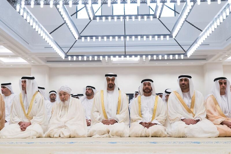 ABU DHABI, UNITED ARAB EMIRATES - June 04, 2019: (R-L) HH Lt General Sheikh Saif bin Zayed Al Nahyan, UAE Deputy Prime Minister and Minister of Interior, HH Sheikh Saeed bin Zayed Al Nahyan, Abu Dhabi Ruler's Representative, HH Sheikh Saif bin Mohamed Al Nahyan,r HH Sheikh Mohamed bin Zayed Al Nahyan, Crown Prince of Abu Dhabi and Deputy Supreme Commander of the UAE Armed Forces, HE Shaykh Abdallah bin Bayyah and HH Sheikh Hazza bin Zayed Al Nahyan, Vice Chairman of the Abu Dhabi Executive Council, attends Eid Al Fitr prayers at the Sheikh Sultan bin Zayed the First mosque in Al Bateen. 

( Rashed Al Mansoori / Ministry of Presidential Affairs )
---