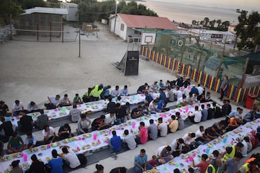 Refugees from Moria camp break their fast at One Happy Family Claire Corkery / The National