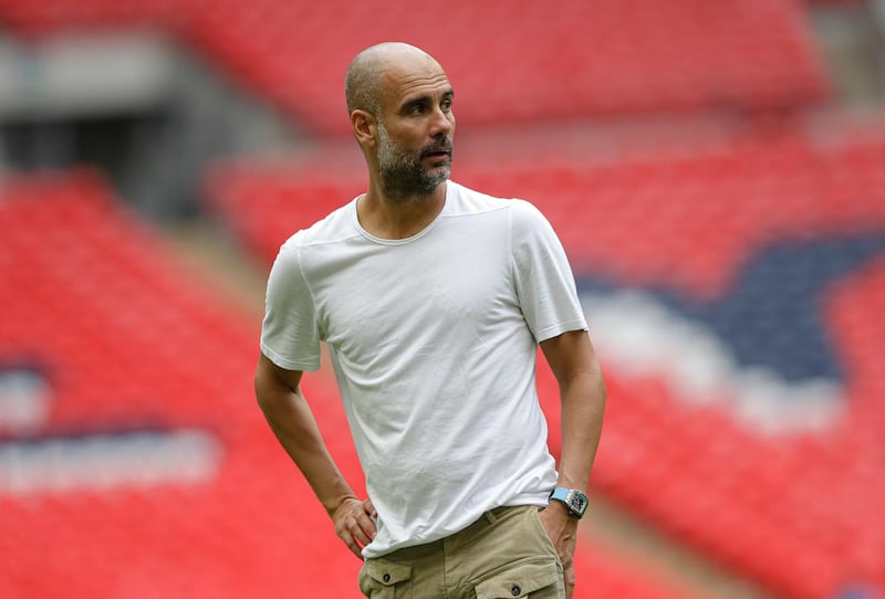 Pep Guardiola is backed by some of our writers to become only the second manager in the Premier League era to win a hat-trick of titles. AP
