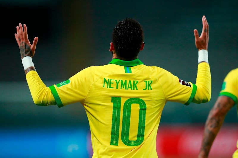 Brazil's Neymar celebrates after scoring a penalty against Peru. AFP