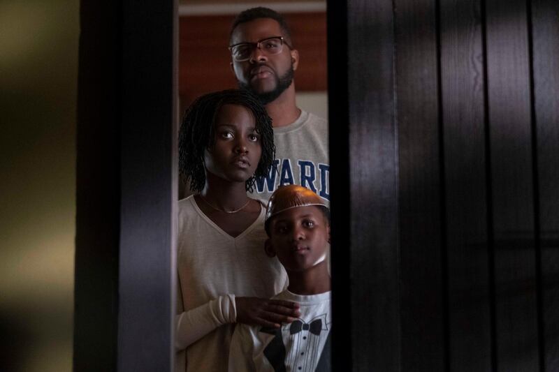Gabe Wilson (Winston Duke), Adelaide Wilson (Lupita Nyong’o) and Jason Wilson (Evan Alex) in "Us," written, produced and directed by Jordan Peele. Courtesy Universal Pictures