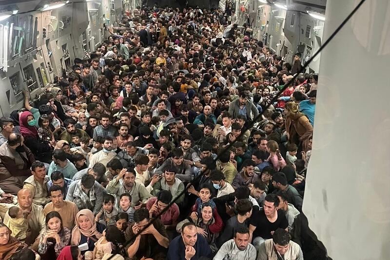 About 640 Afghans crowded into a US C-17 military jet as they rushed to leave Kabul this week. Via AFP
