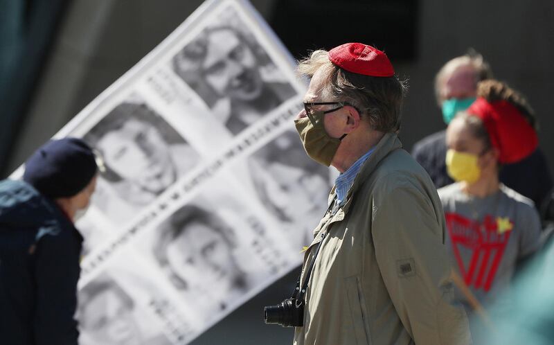 POLAND: A man wears a face mask in Warsaw, on April 19, 2020, during an anniversary ceremony for the ill-fated struggle of the 1943 Warsaw Ghetto Uprising. AP Photo