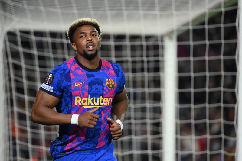 Barcelona's Spanish forward Adama Traore leaves the pitch during the UEFA Europa League round of 16 first leg football match between FC Barcelona and Galatasaray at the Camp Nou stadium in Barcelona on March 10, 2022.  (Photo by LLUIS GENE  /  AFP)