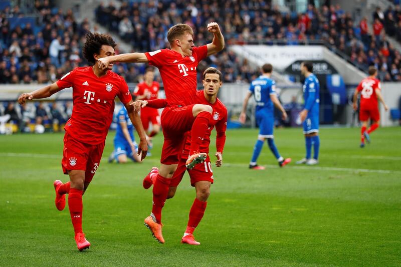 Bayern Munich's Joshua Kimmich celebrates scoring their second goal with teammates. Reuters