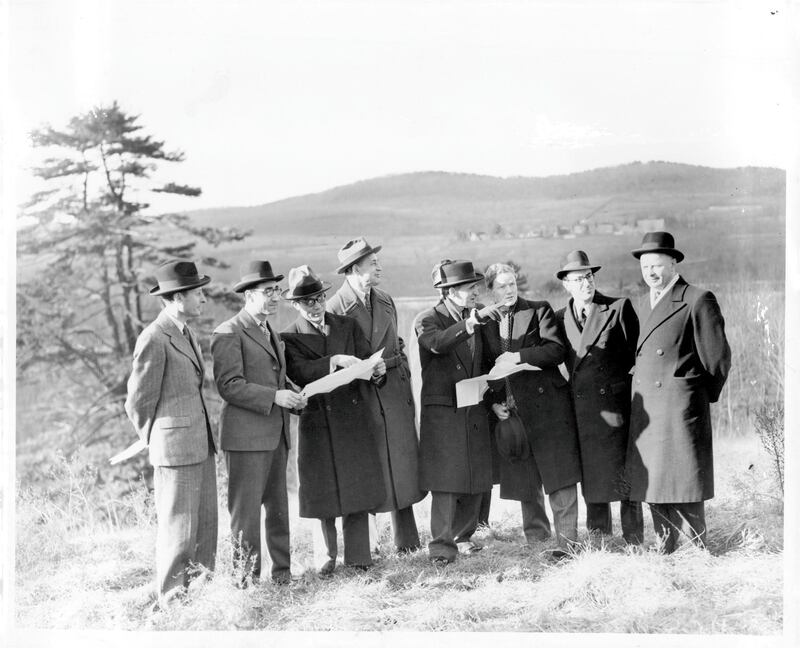 United Nations Organization site pickers inspecting Archibald Rogers's estate at Hyde Park. From left: Francois Briere, France; Awn el Khalidi, Iraq; Dr. Shu Hsi-hsu, China; Huntington Gilchrist, United States; Dr. Stoyan Gavrilovich, Yugoslavia; Maj. K. G. Younger, United Kingdom; Julio A. Lacarte, Uruguay; and Georgia Saksin, USSR.. January 11, 1946. (Photo by Anthony Calvacca/New York Post Archives /(c) NYP Holdings, Inc. via Getty Images)