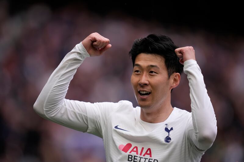 Tottenham's Son Heung-min celebrates after scoring his side's third goal. AP