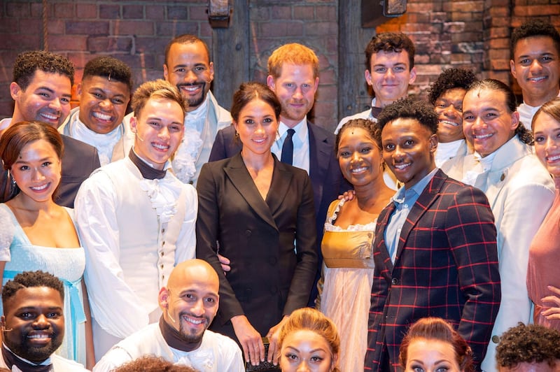 LONDON, ENGLAND - AUGUST 29:  Meghan, Duchess of Sussex (C) and Prince Harry, Duke of Sussex meet the cast and crew of "Hamilton" backstage after the gala performance in support of Sentebale at Victoria Palace Theatre on August 29, 2018 in London, England. (Photo by Dan Charity - WPA Pool/Getty Images)