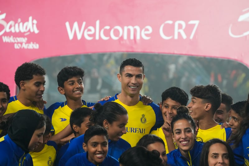 Cristiano Ronaldo smiles at his official unveiling by Al Nassr football club at Mrsool Park in Riyadh, Saudi Arabia, on Tuesday, January 3, 2023. AP 