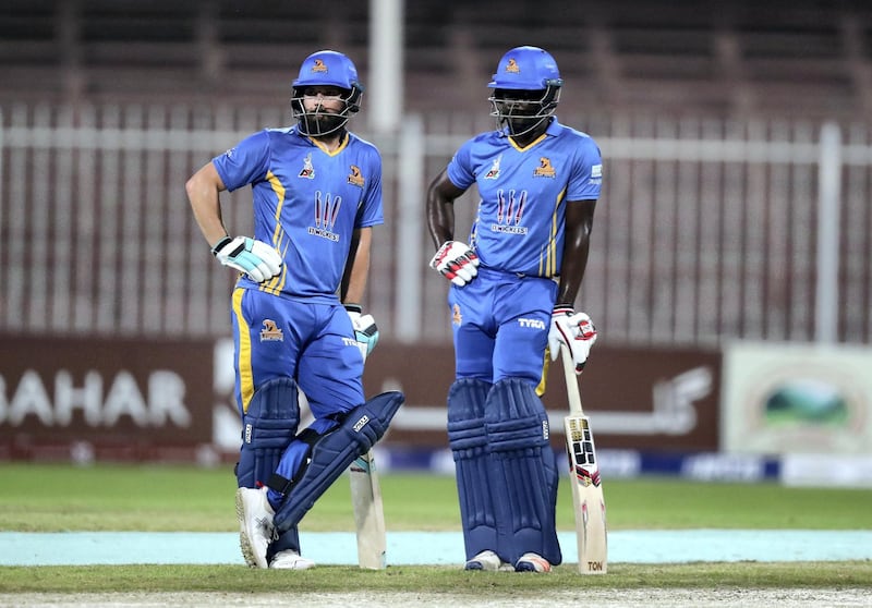Sharjah, United Arab Emirates - October 17, 2018: Andre Fletcher (R) and Anton Devcich of the Nangarhar Leopards bats during the game between Balkh Legends and Nangarhar Leopards in the Afghanistan Premier League. Wednesday, October 17th, 2018 at Sharjah Cricket Stadium, Sharjah. Chris Whiteoak / The National