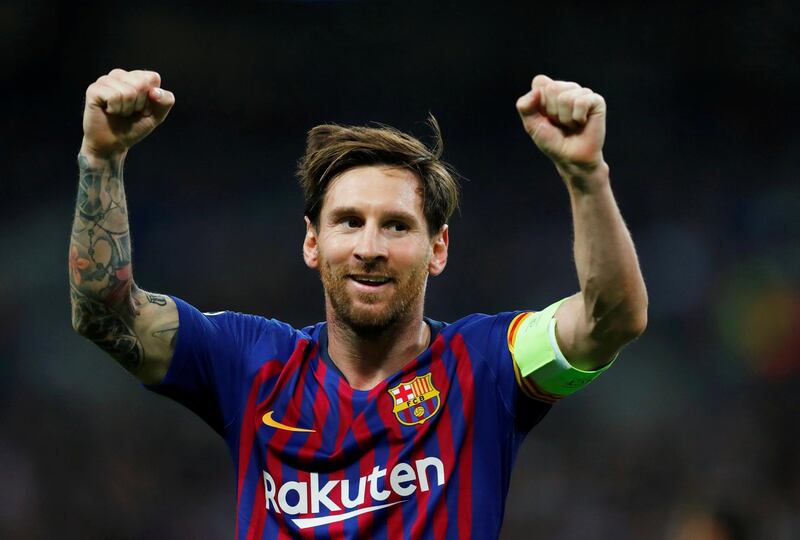 Barcelona's Lionel Messi celebrates scoring their third goal. Reuters