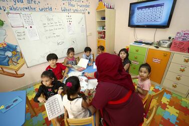 Children of inmates get together to learn in a class at Dubai Female Prison. Chris Whiteoak / The National