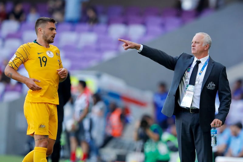 Australia head coach Graham Arnold, right, gives instructions from the sidelines. AP Photo