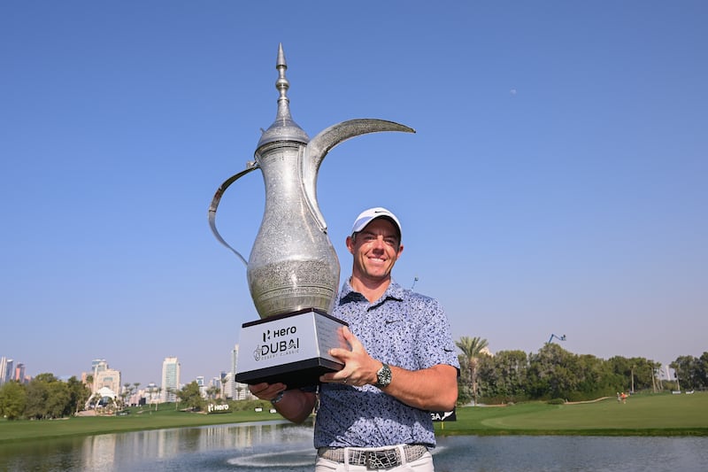 Rory McIlroy with the Dallah trophy after winning the Dubai Desert Classic, beating Patrick Reed by one shot thanks to a birdie on the final hole. Getty