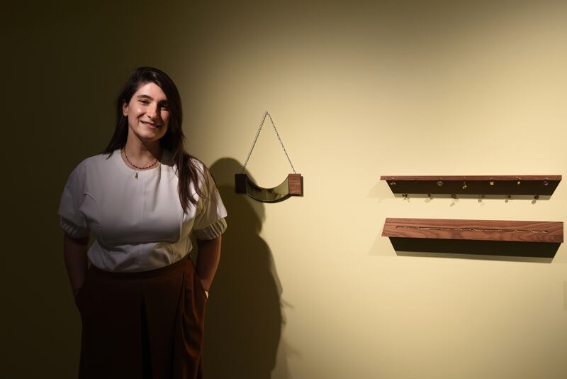 Taus Makhacheva  with her work 'Mining Serendipity' at Louvre Abu Dhabi. Vidhyaa Chandramohan / The National