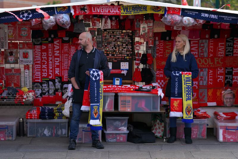 A fan shop opens up outside Anfield Stadium. AP